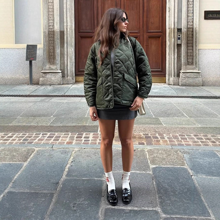 Women's quilted oversized jacket with cord collar, snap button closure and patch flap pockets Mune Fashion
