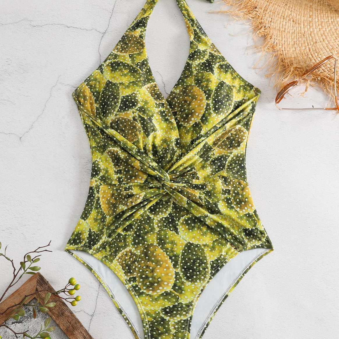 Women's one-piece swimsuit with playful knot design and floral pattern Mune Fashion