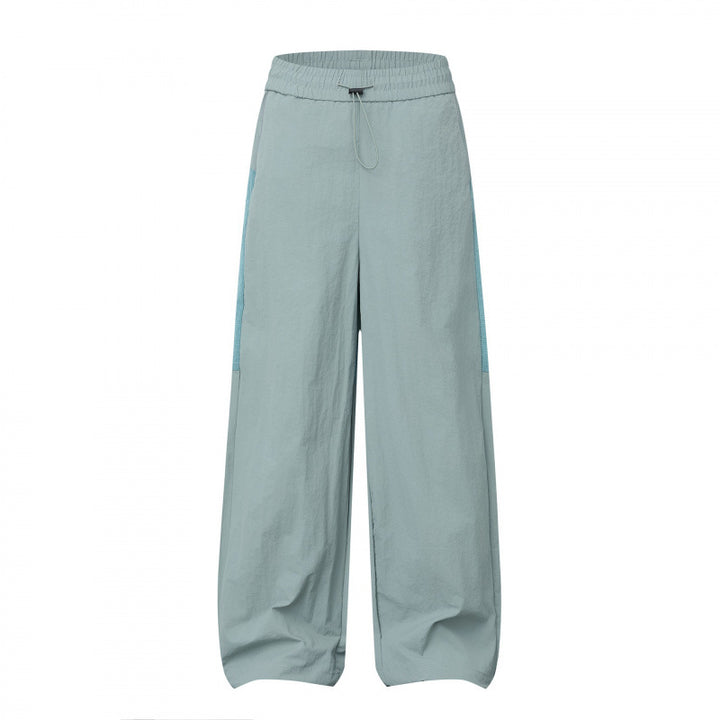 Women Wide Cargo-Style Pants with Elastic Waistband, Drawstring and Side Inset Details Mune Fashion
