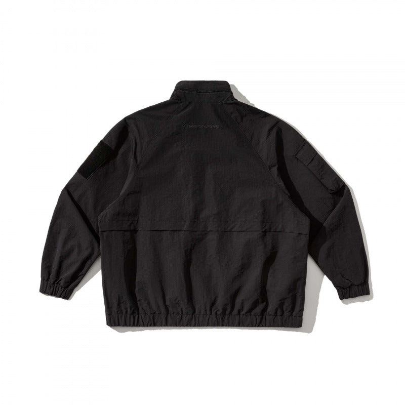 Unisex Oversize Utility Jacket with multifunctional pockets, high stand-up collar, and elastic hem Mune Fashion