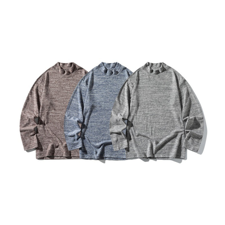 Unisex fine knit mock neck sweater with mottled structure and relaxed fit Mune Fashion