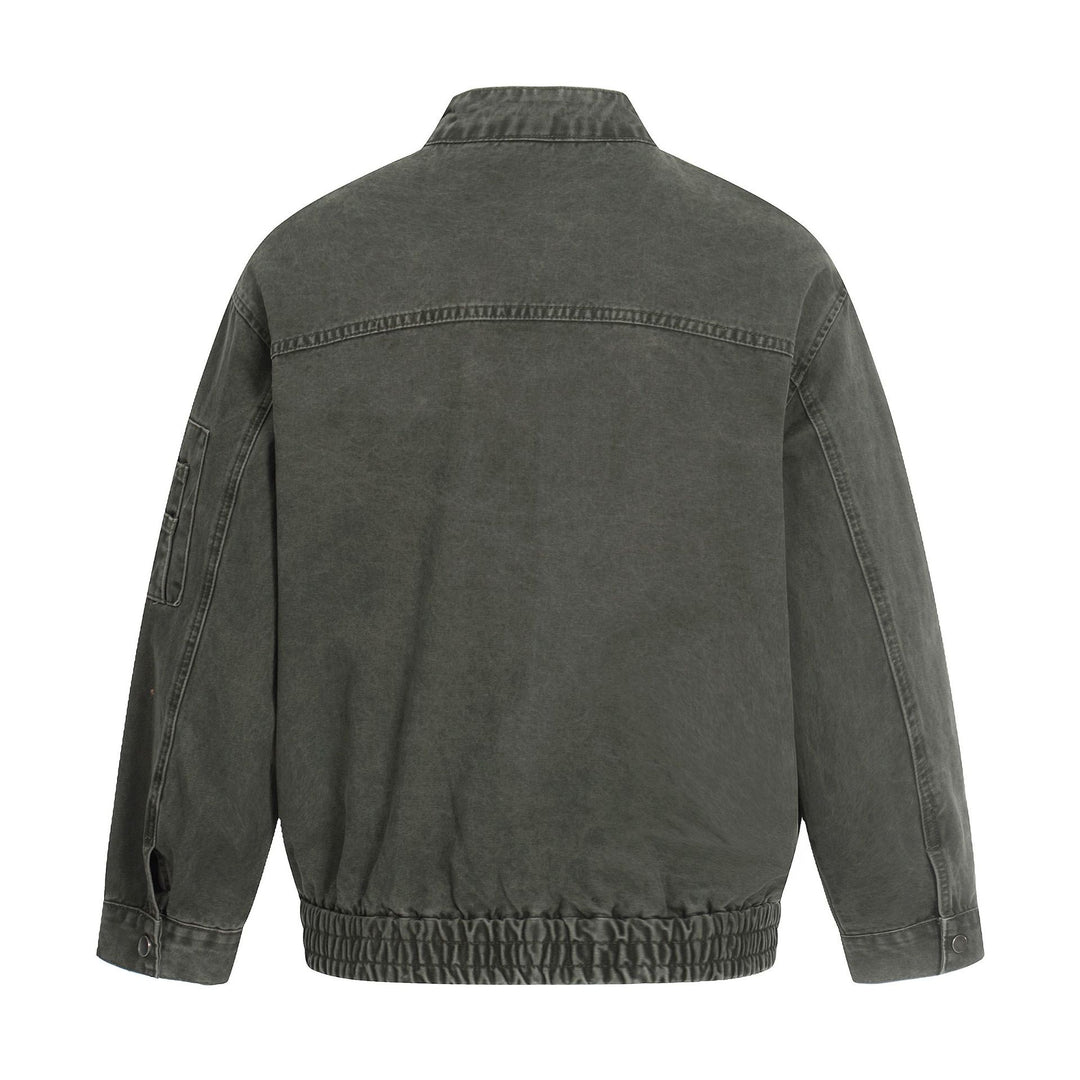 Men's short cut vintage-wash bomber jacket in boxy cut with stand-up collar and sleeve zip.