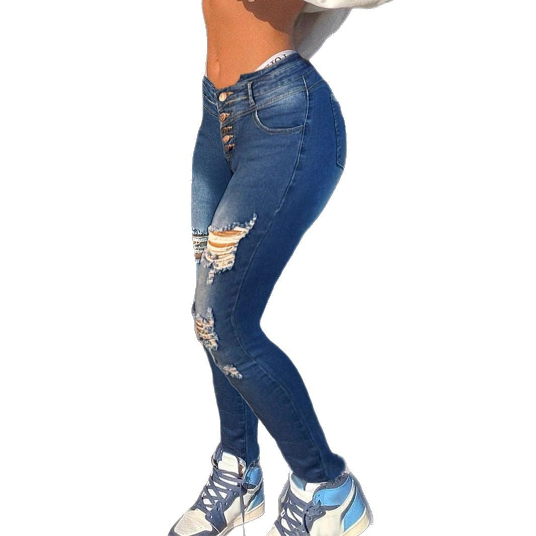 Ladies shaping high-waist skinny jeans with asymmetric rips and fringe patch Mune Fashion