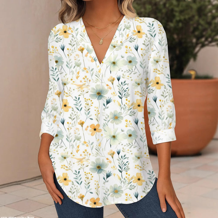 Women's Floral V-Neck Tunic Blouse with Three-Quarter Sleeves and Rounded Hem Mune Fashion
