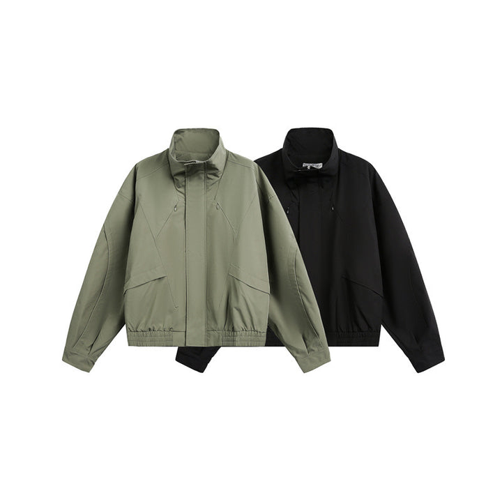 Unisex short jacket in minimalist tech fabric with funnel collar and concealed front placket Mune Fashion