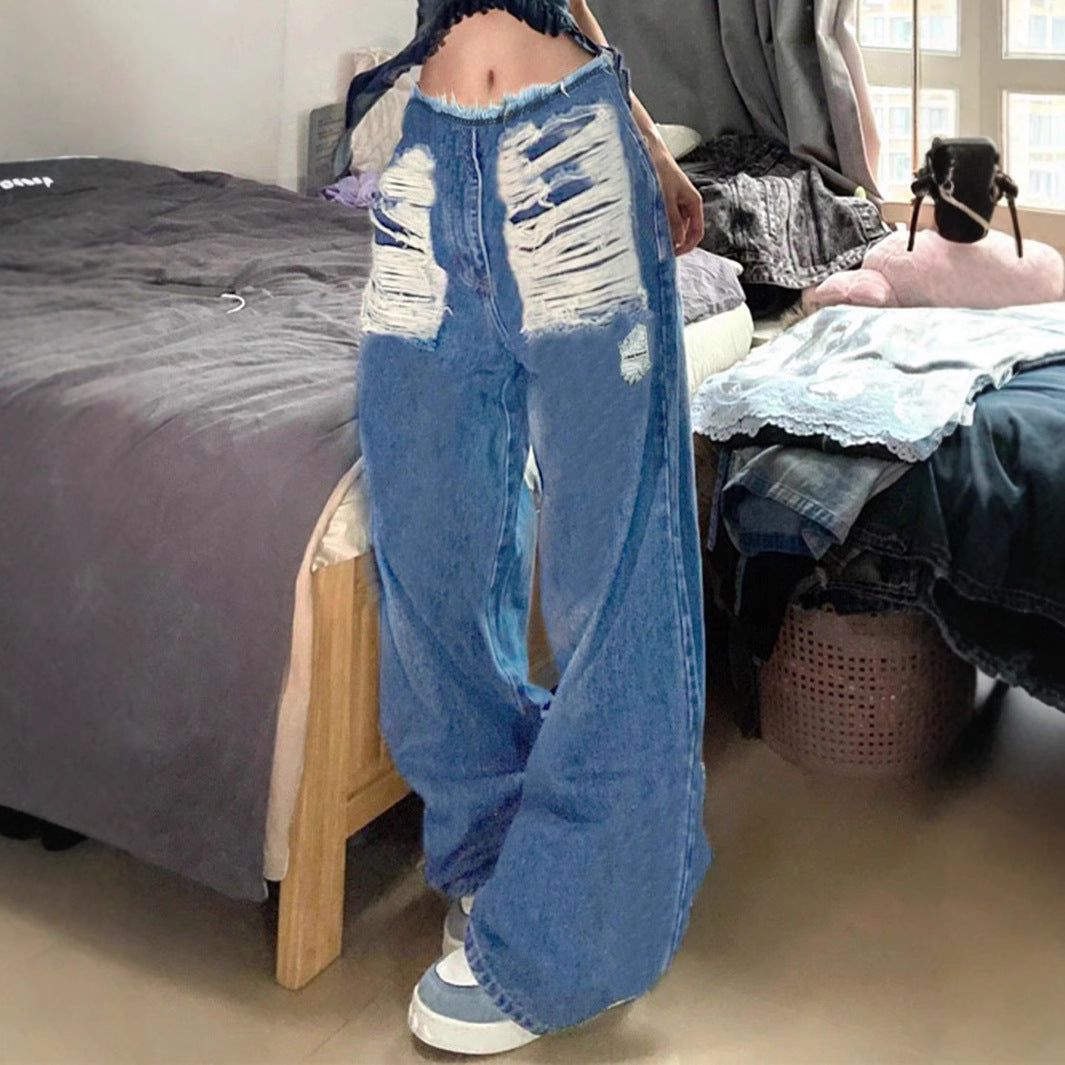 Women's high-cut wide denim jeans with heavily distressed front and raw waistband Mune Fashion