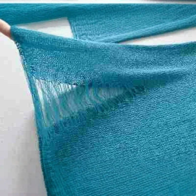 Women's fine knit tunic with bateau neckline, figure-hugging and bell sleeves Mune Fashion