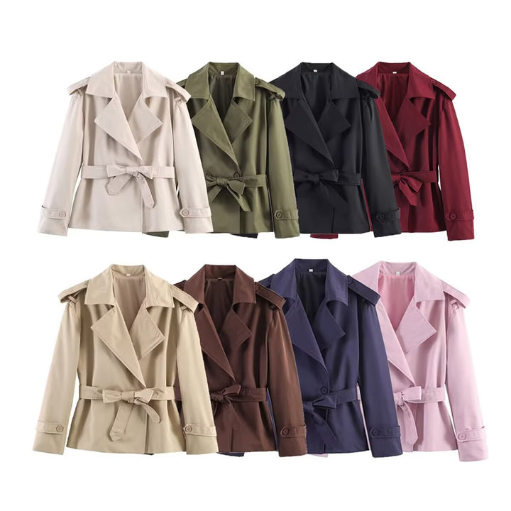 Women short trench coat with waist belt, double-breasted front and shoulder flaps Mune Fashion
