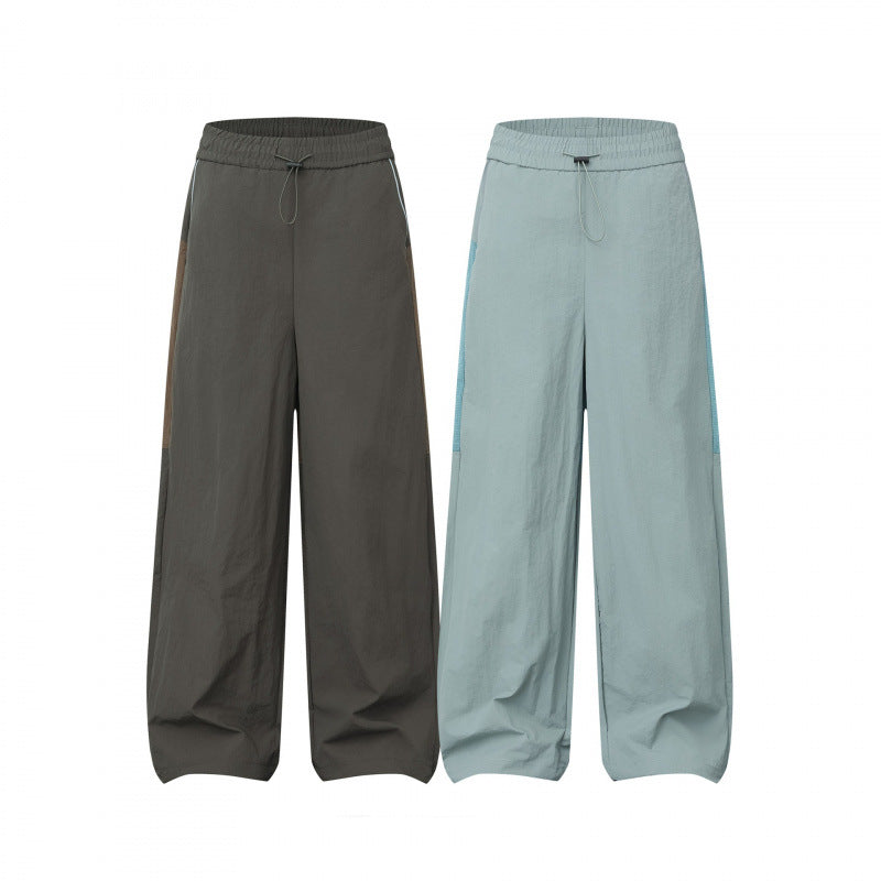 Women Wide Cargo-Style Pants with Elastic Waistband, Drawstring and Side Inset Details Mune Fashion
