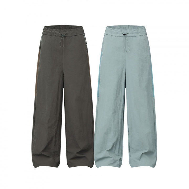 Women Wide Cargo-Style Pants with Elastic Waistband, Drawstring and Side Inset Details Mune Fashion