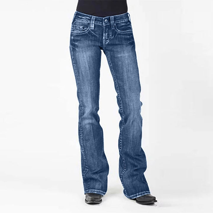 Ladies elegant bootcut jeans with a high waistband and subtle wash