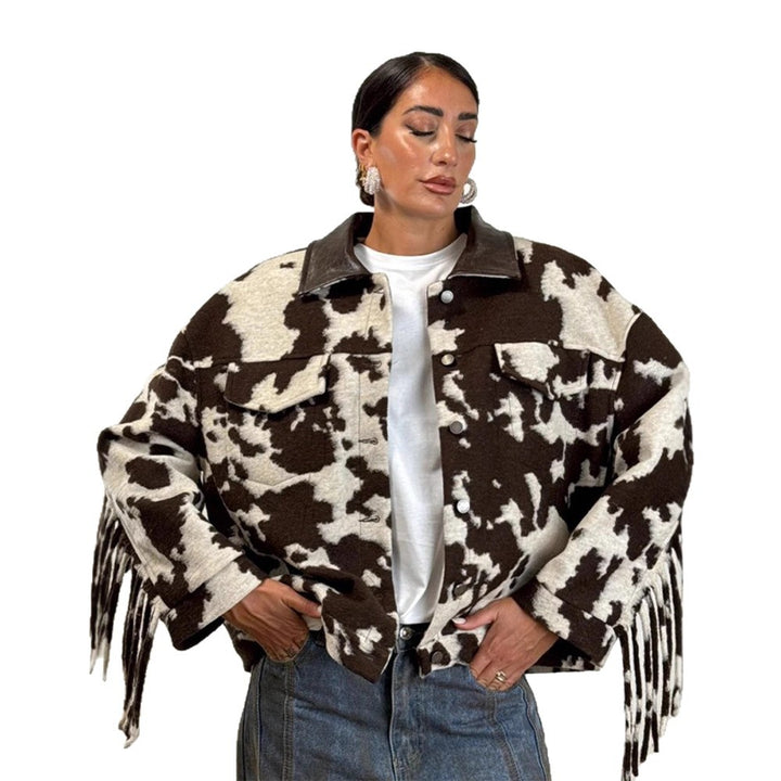 Ladies short jacket in cow print with fringes, faux fur look and leather collar Mune Fashion