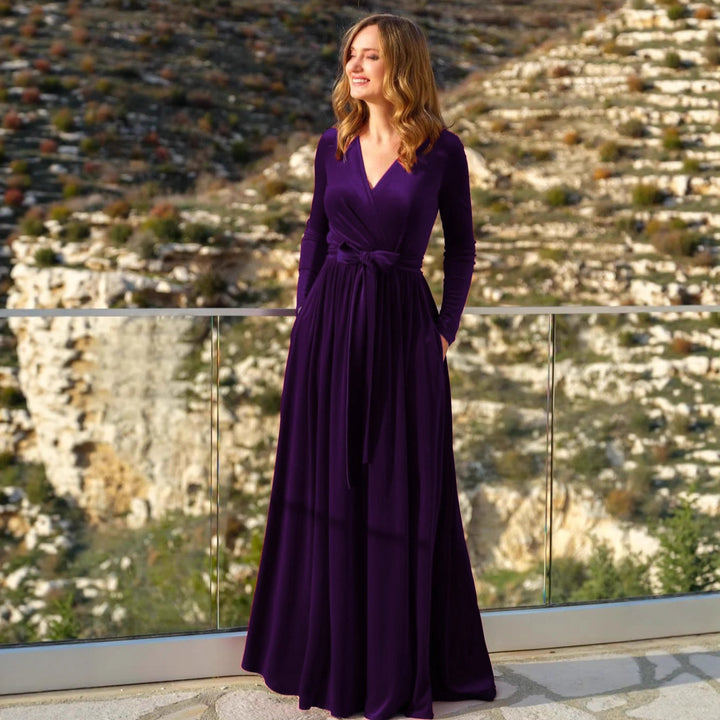 Women's elegant wrap maxi dress made of velvet with V-neck, waist belt, and side pockets Mune Fashion