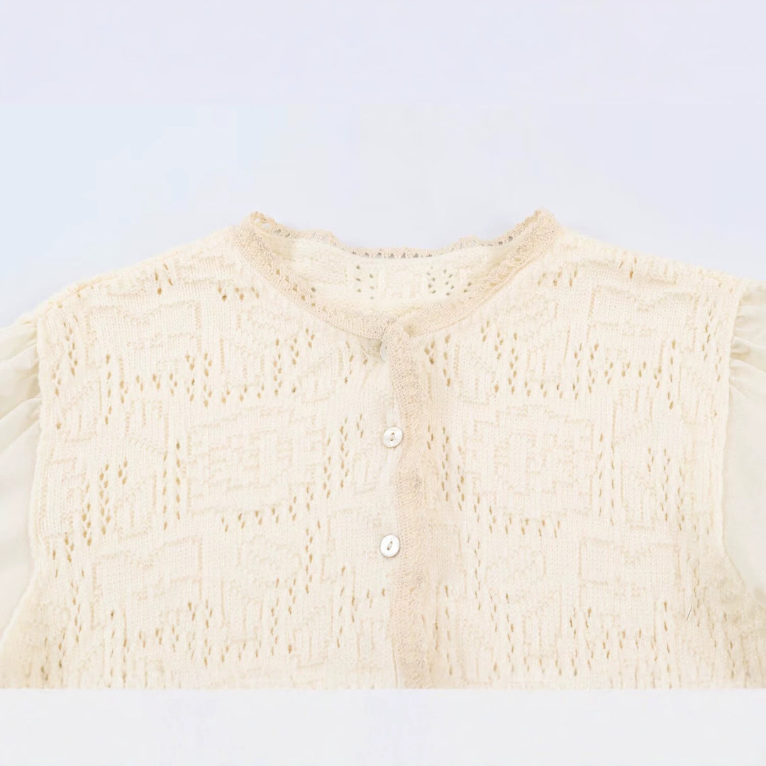 Ladies crochet blouse with lace sleeves, ruffle hem and button placket Mune Fashion