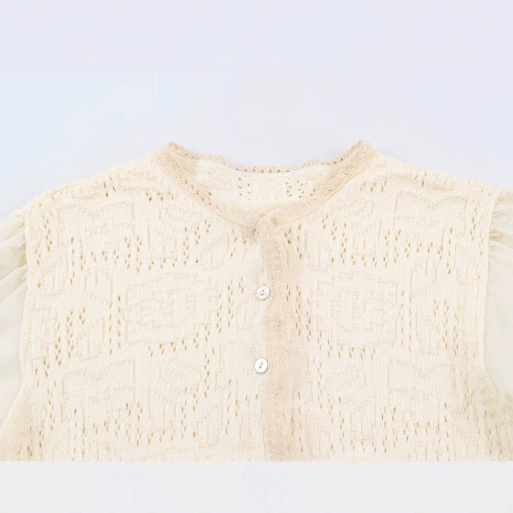 Ladies crochet blouse with lace sleeves, ruffle hem and button placket Mune Fashion