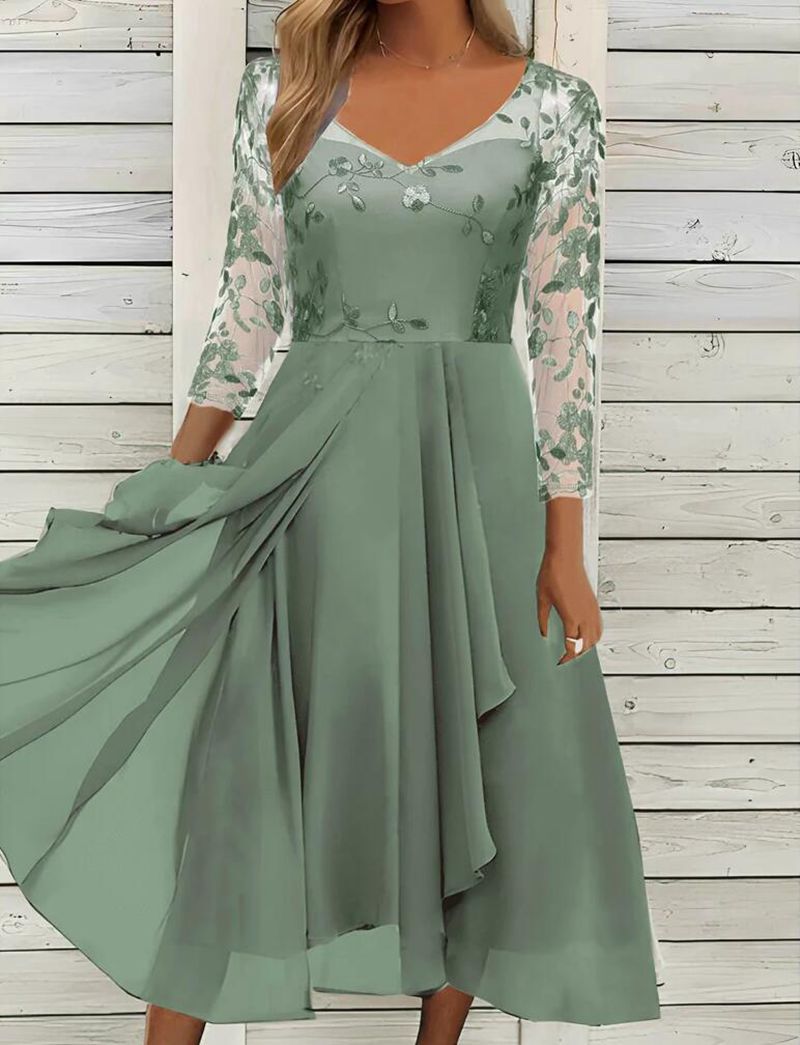 Women’s elegant midi dress with embroidered tulle top, transparent three-quarter sleeves, and layered draped skirt Mune Fashion