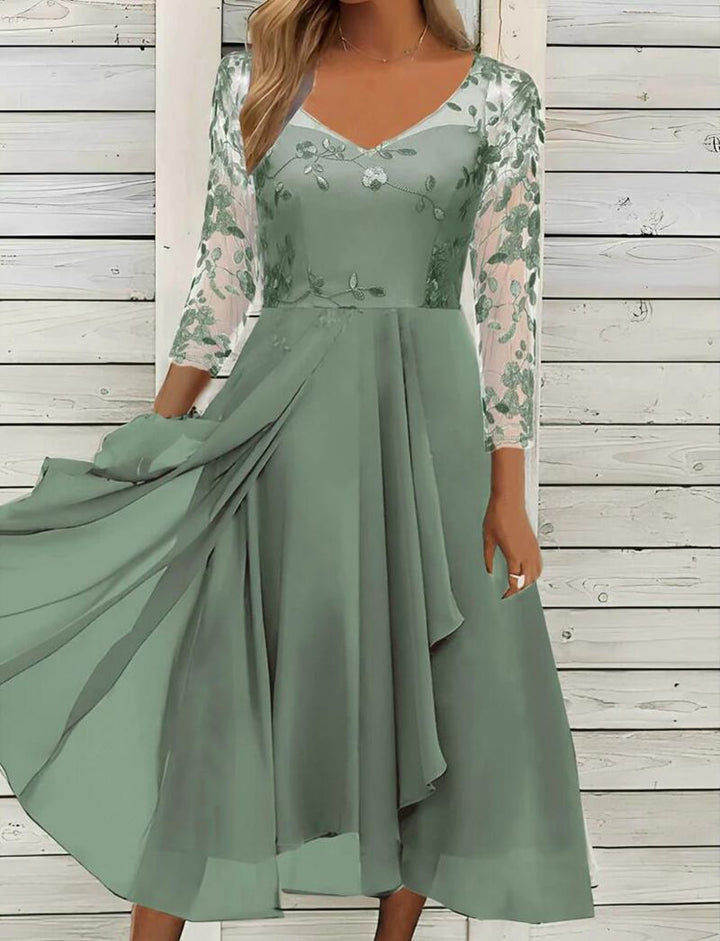 Women’s elegant midi dress with embroidered tulle top, transparent three-quarter sleeves, and layered draped skirt Mune Fashion
