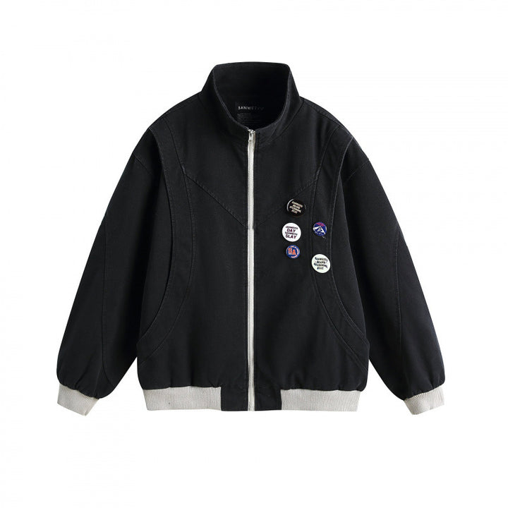 Unisex Boxige lightweight bomber jacket with stand-up collar, front zipper and badge applications Mune Fashion