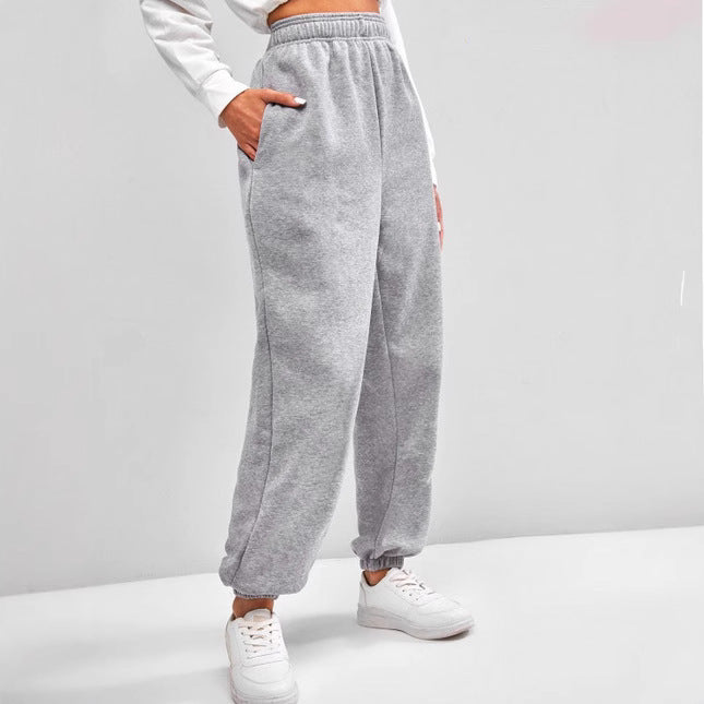 Women's high-cut Relax-Fit jogging pants with elastic waistband, side pockets, and gathered leg cuffs Mune Fashion