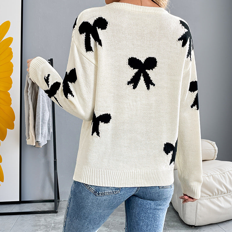 Women's fine-knit pullover with bow jacquard, round neck and ribbed cuffs Mune Fashion