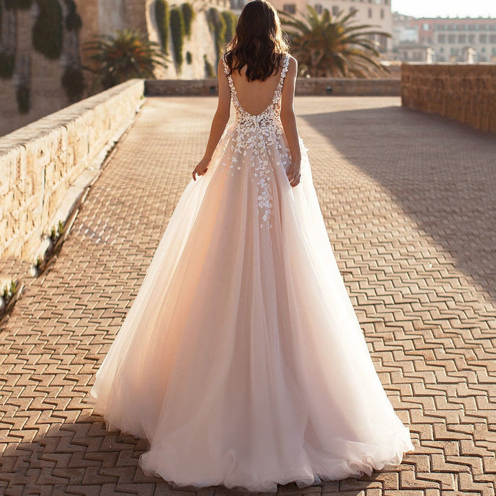 Festive Women's Wedding Dress with Floral Appliqués and Shimmering Tulle for Weddings | Mune Fashion