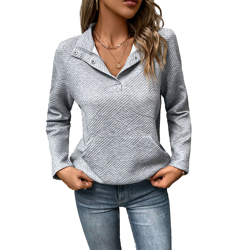 Women’s quilted sweatshirt with flap collar, snap button detail, and kangaroo pocket Mune Fashion