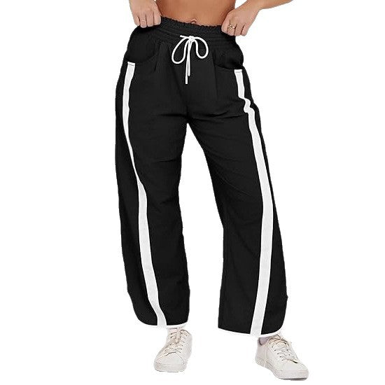 Women's nan relaxed track pants with side contrast stripe, elastic smocked waistband, and side pockets Mune Fashion