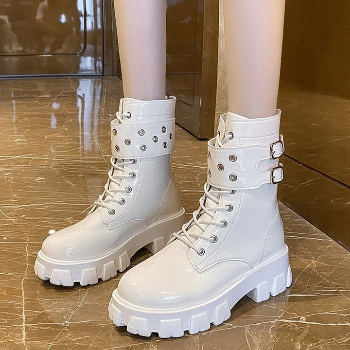 Women's glossy patent combat boots with chunky tractor sole, double straps and metallic eyelets Mune Fashion
