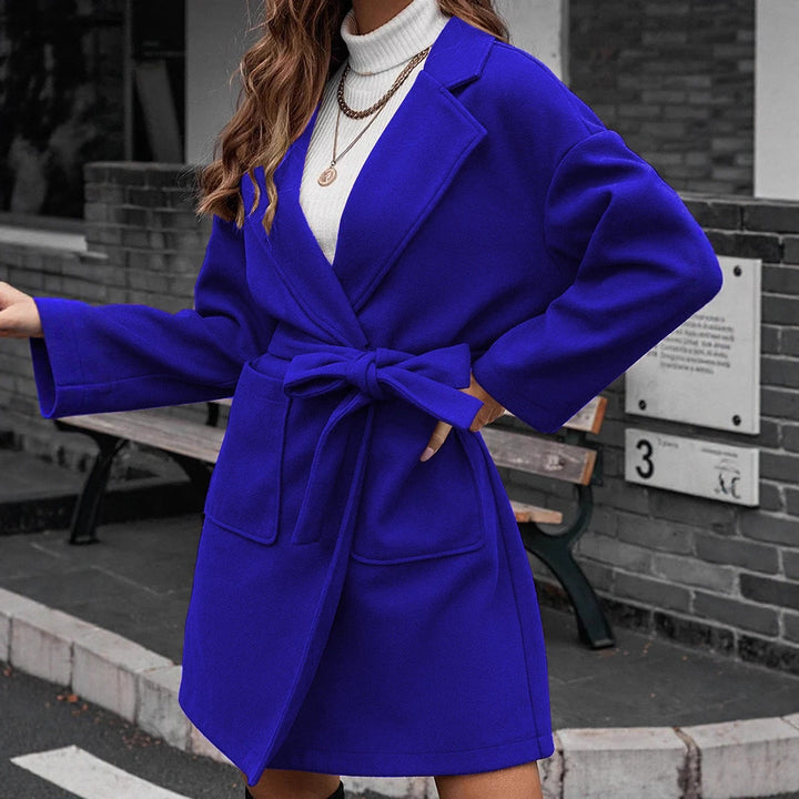 Ladies wrap coat with tie belt, large flap pocket and lapel collar Mune Fashion