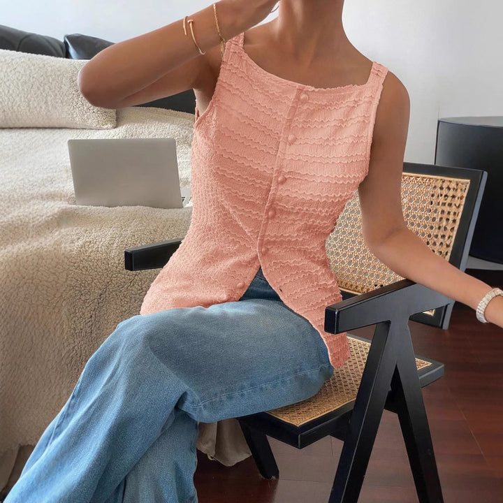 Women's sleeveless structured top with decorative button placket and front slit Mune Fashion