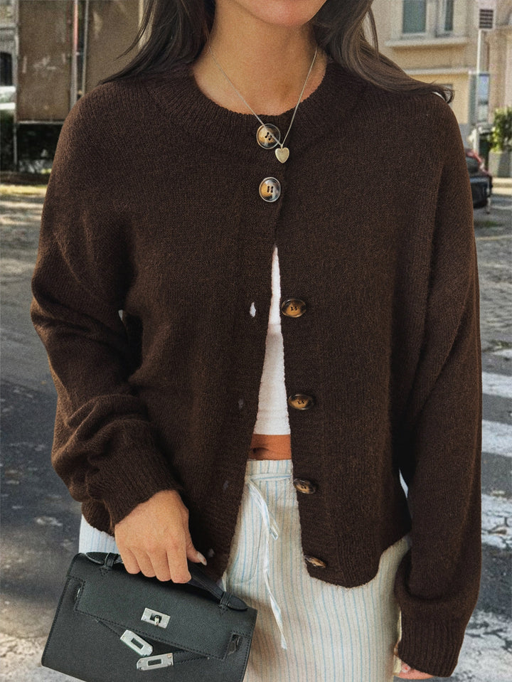 Women's cozy oversized knitted cardigan with horn button placket and round neckline Mune Fashion