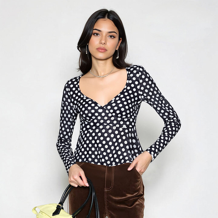 Women's long-sleeve top with polka dot pattern, fitted peplum and heart-shaped neckline Mune Fashion