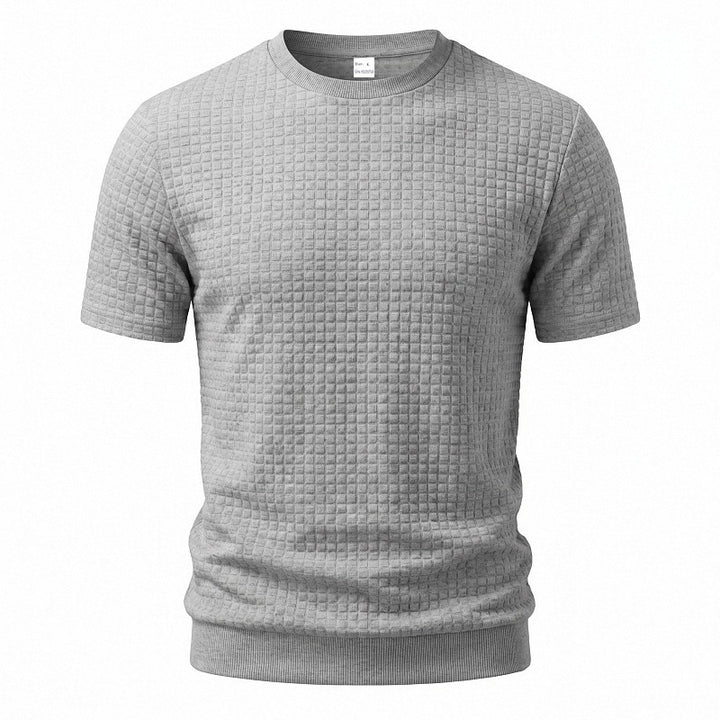 Men's short-sleeved knit shirt with embossed check structure, round neckline, and ribbed hem Mune Fashion