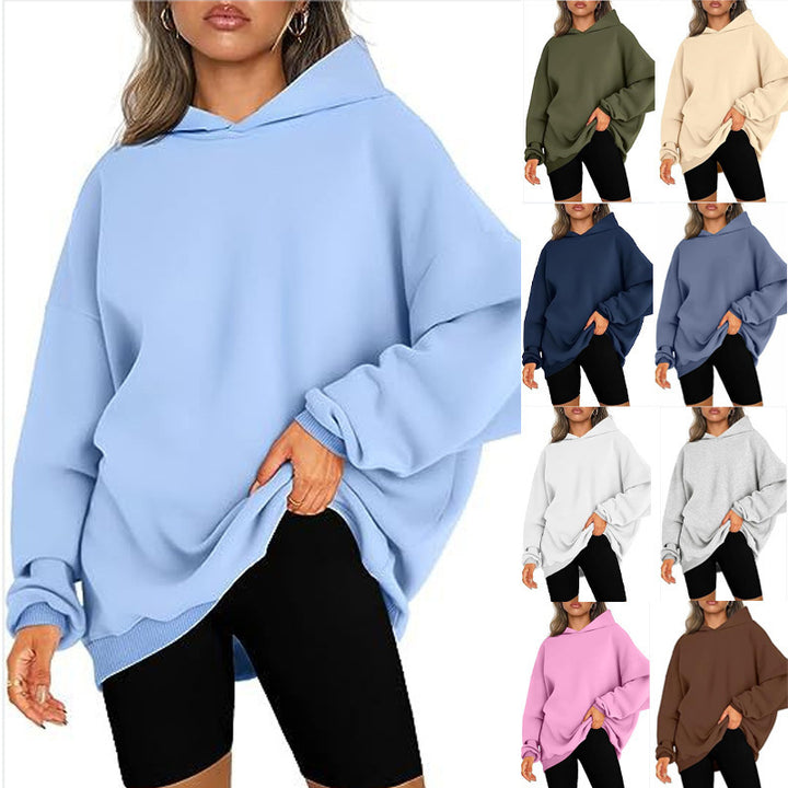 Women's oversized hoodie in longline cut with raglan sleeves and soft inner lining Mune Fashion