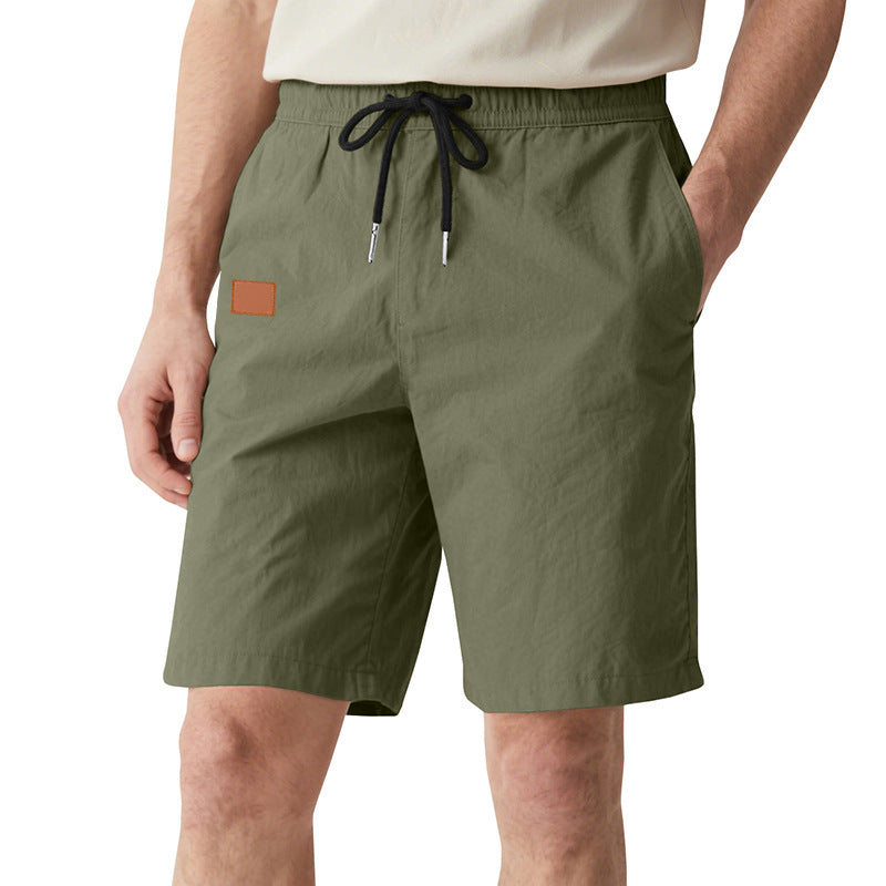 Men's quick-drying swim shorts in Bermuda cut with elastic waistband and drawstring Mune Fashion