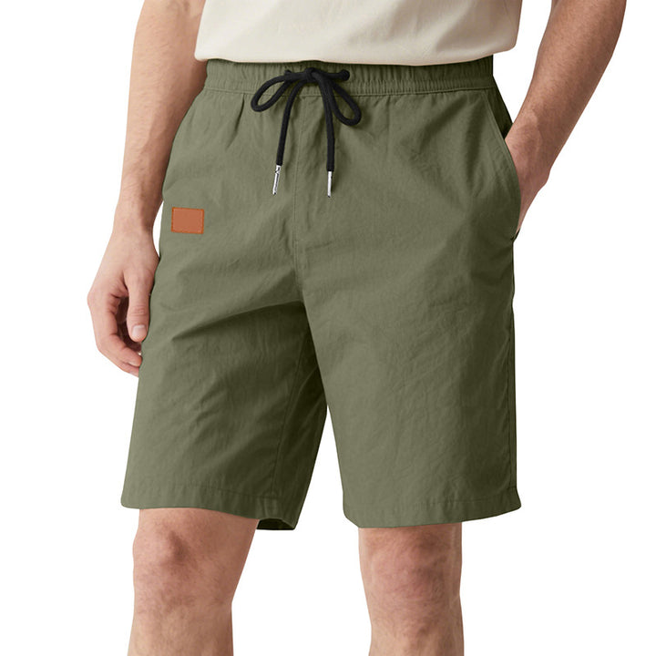Men's quick-drying swim shorts in Bermuda cut with elastic waistband and drawstring Mune Fashion
