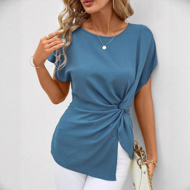 Women's fitted short sleeve draped shirt with side knot sling and textured crepe look Mune Fashion