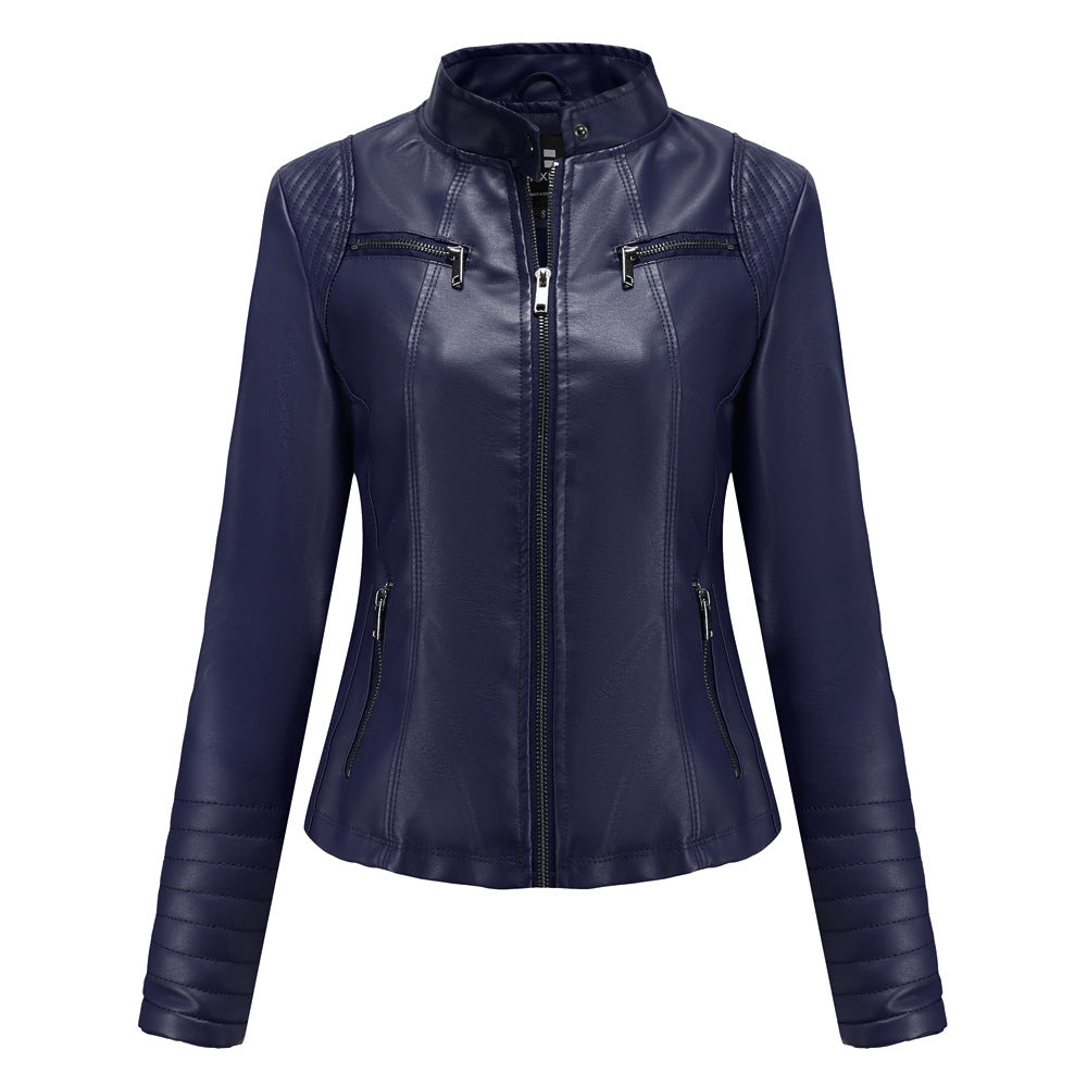 Women's fitted biker jacket made of faux leather with stand-up collar and quilted sleeve section Mune Fashion