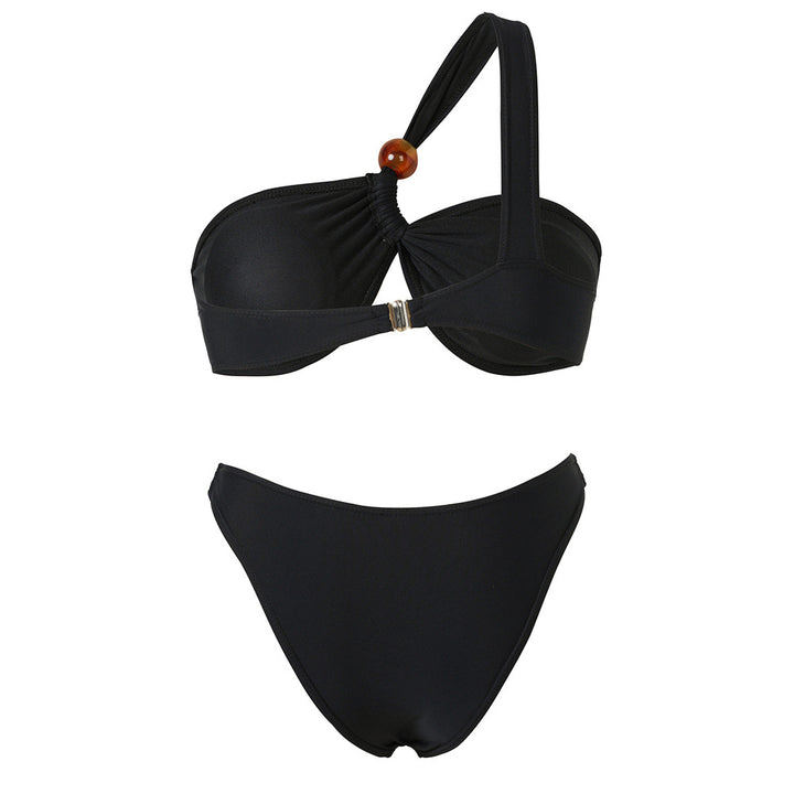 Women's bikini set with asymmetric halter neck and decorative pants buttons Mune Fashion