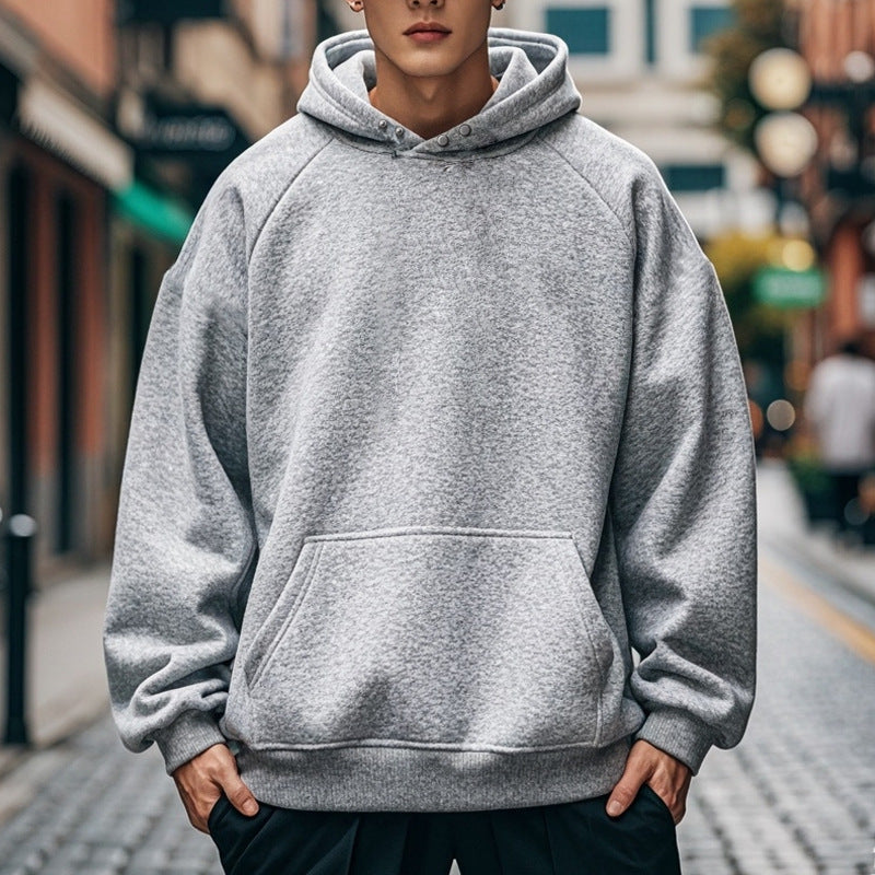 Men's oversized hoodie with kangaroo pocket, raglan sleeves, and ribbed cuffs Mune Fashion