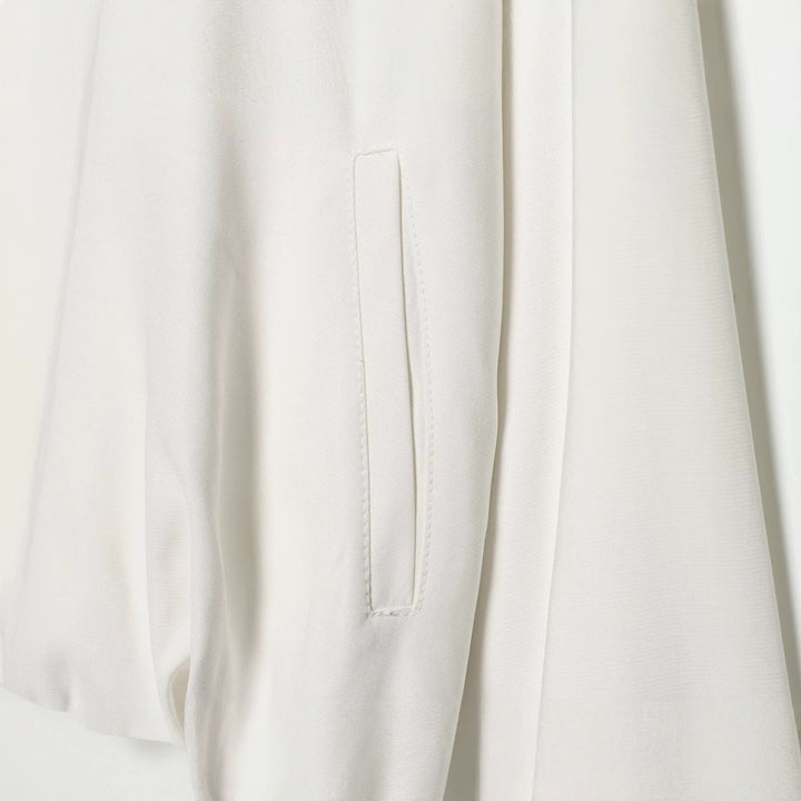 Women's Light Cropped Windbreaker in Boxy Cut with High Funnel Neck and Sleeve Flap Pockets Mune Fashion