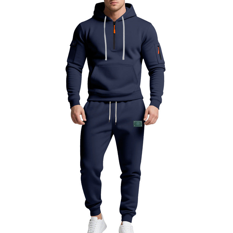 Men's half-zip hoodie and tapered jogger set with kangaroo pocket, zipper details, and elastic drawstring waistband Mune Fashion