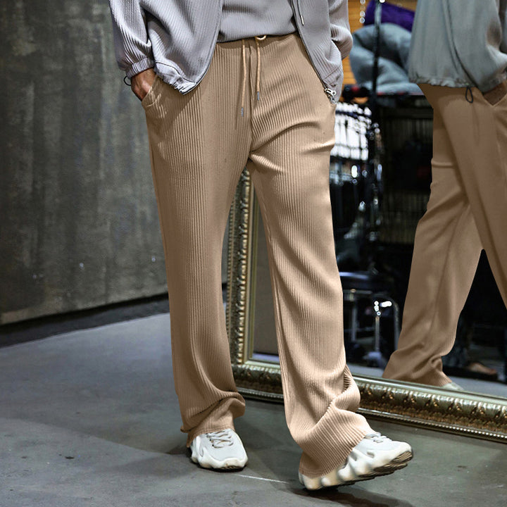 Men's loosely cut pleated trousers with drawstring and wide leg Mune Fashion