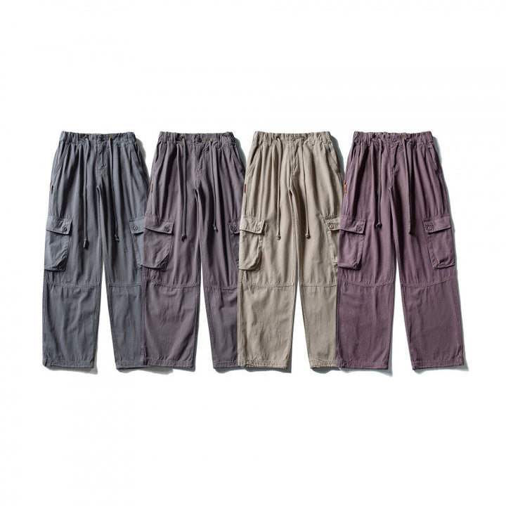 Men's cargo pants with wide leg, elastic drawstring waistband, and patch flap pockets Mune Fashion