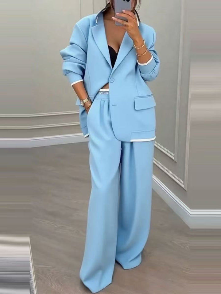 Women Oversize Tailoring Set with contrast piping, single-button blazer and high-cut wide-leg pants Mune Fashion