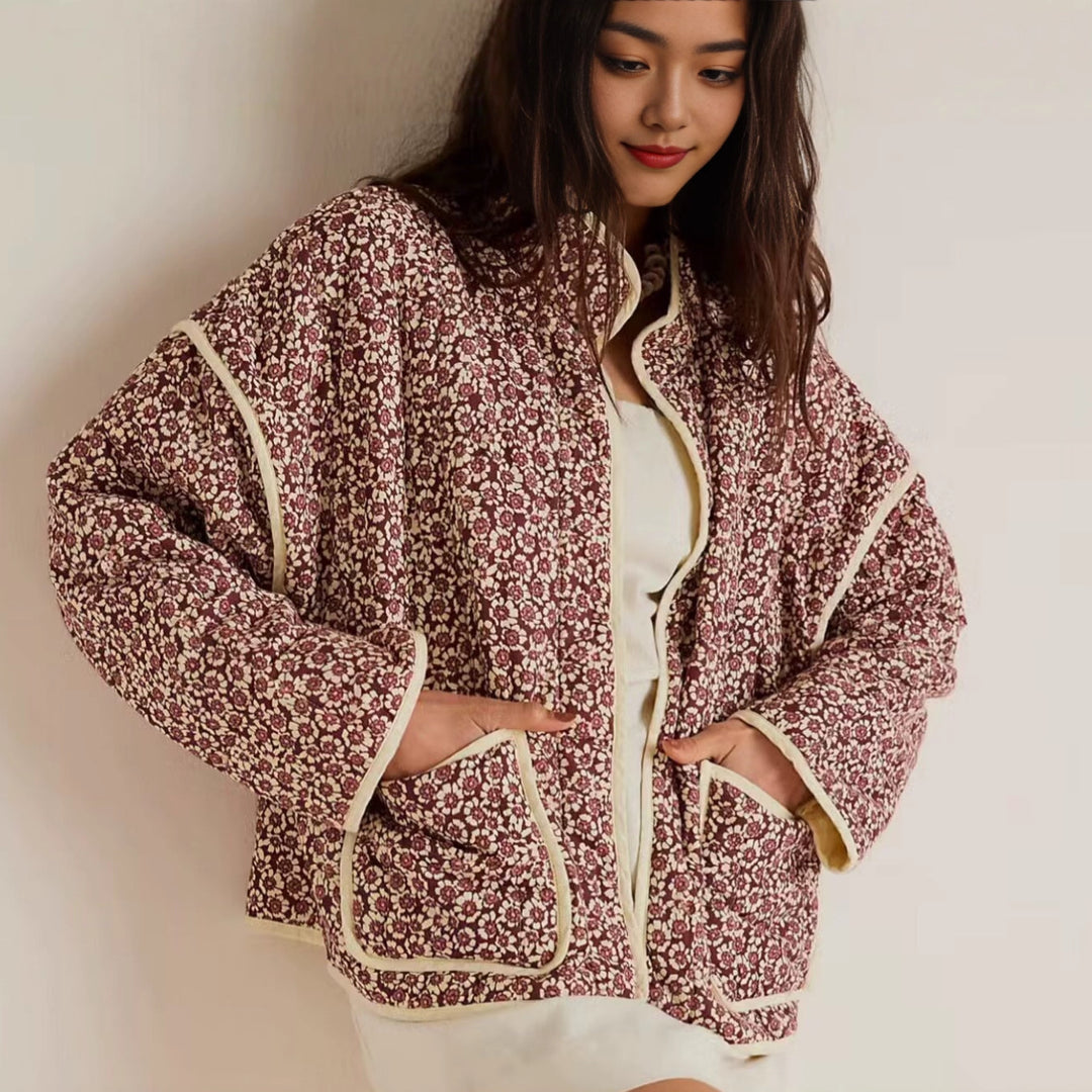 Women's nan quilted stand-up collar jacket with floral vertical print, patch pockets, and contrasting piping Mune Fashion
