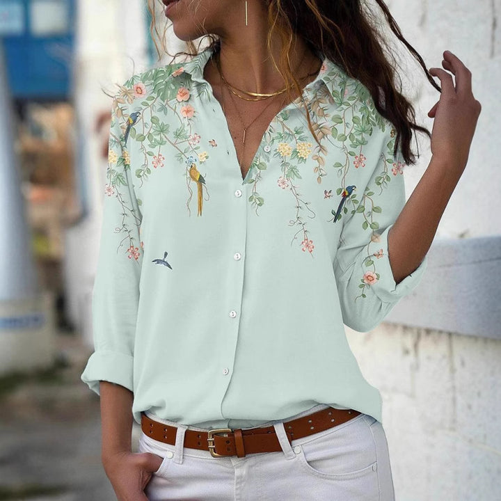 Women’s lightweight chiffon blouse with floral bird print, button placket and casual cut Mune Fashion