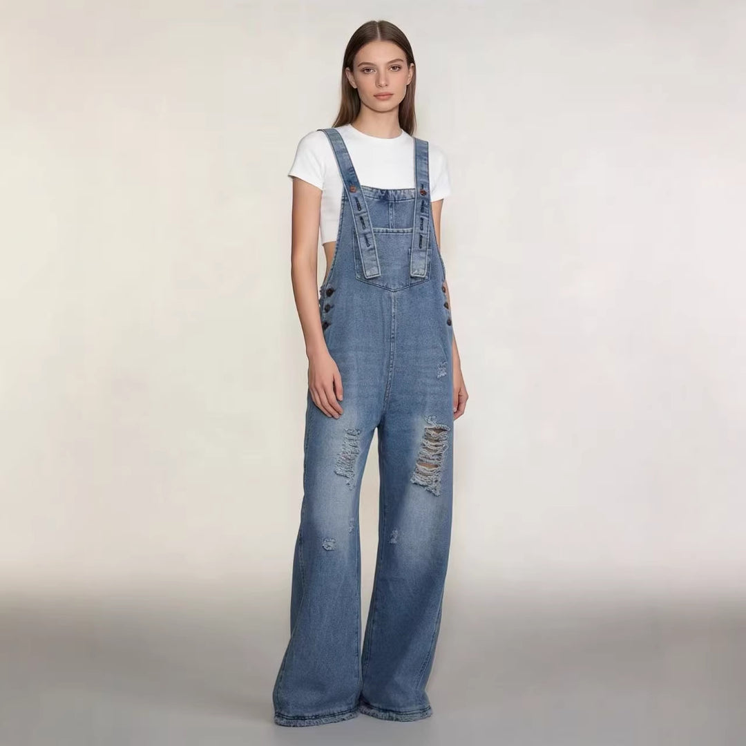 Women's modern baggy overalls made of pigment-dyed stretch denim with adjustable straps and visible rips Mune Fashion