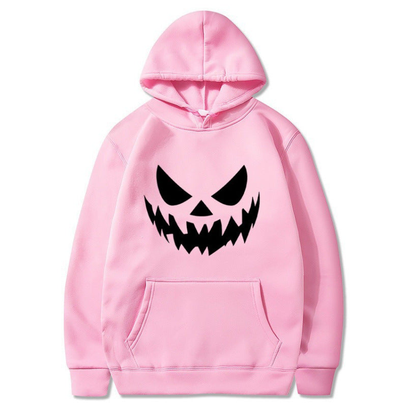 Unisex hooded sweatshirt with creepy pumpkin face print and oversized kangaroo pocket Mune Fashion