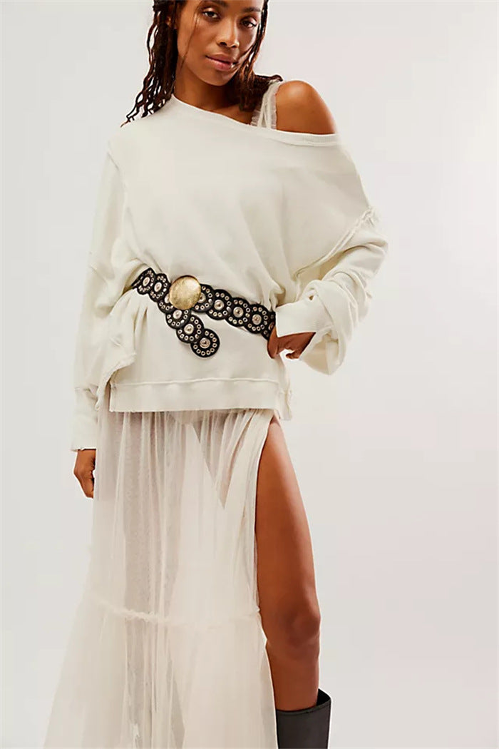Women's oversized sweatshirt with balloon sleeves, open seam stitches, and side slits Mune Fashion